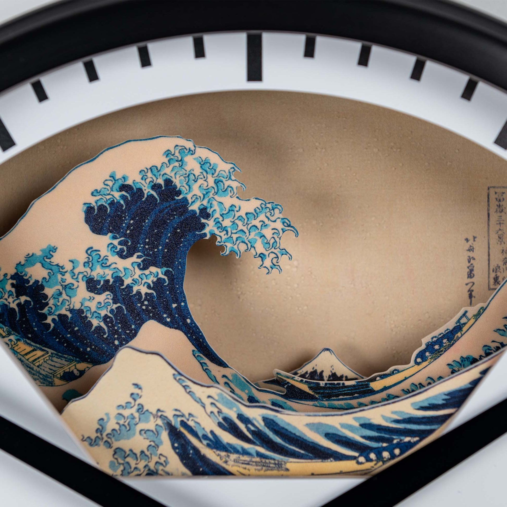 The Hokusai Tide Art Clock features a 3D design of The Great Wave Off Kanagawa and Mount Fuji on the lower half, bringing iconic Japanese art into your space.