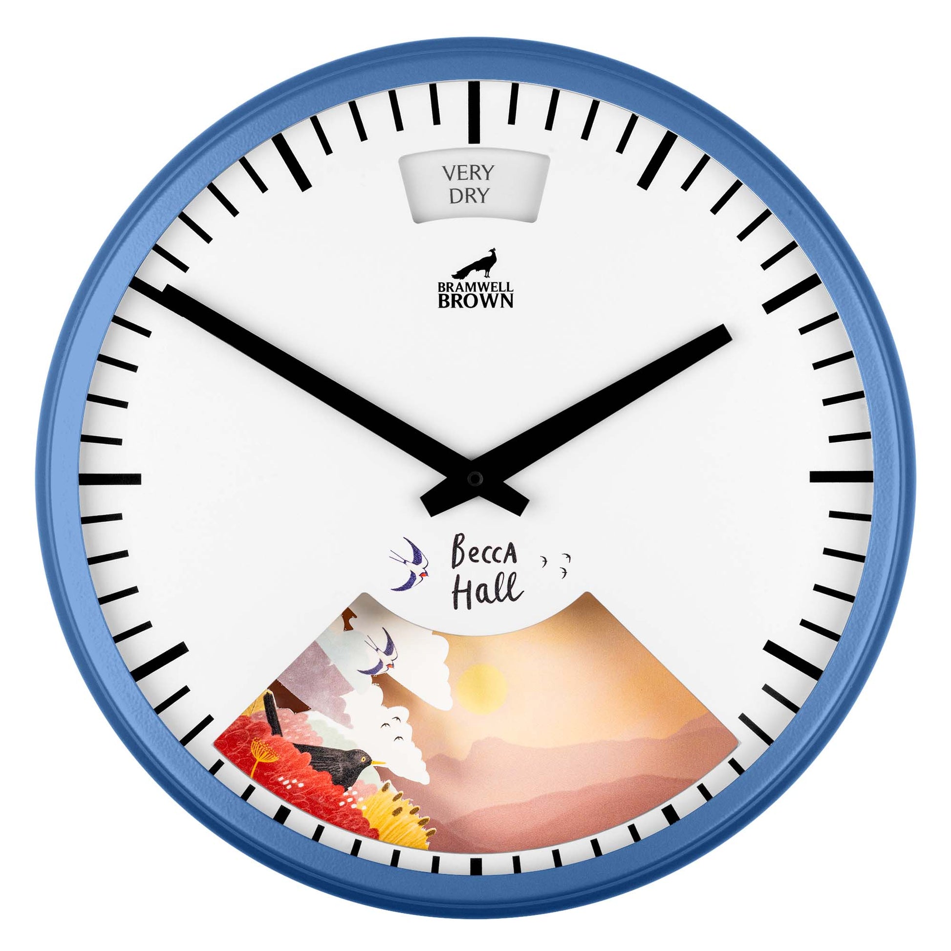 A blue-rimmed wall clock with black hands, bold black hour markers, and Becca Hall with a nature illustration near the bottom. The upper part reads VERY DRY and BRAMWELL BROWN with a small weather vane icon.