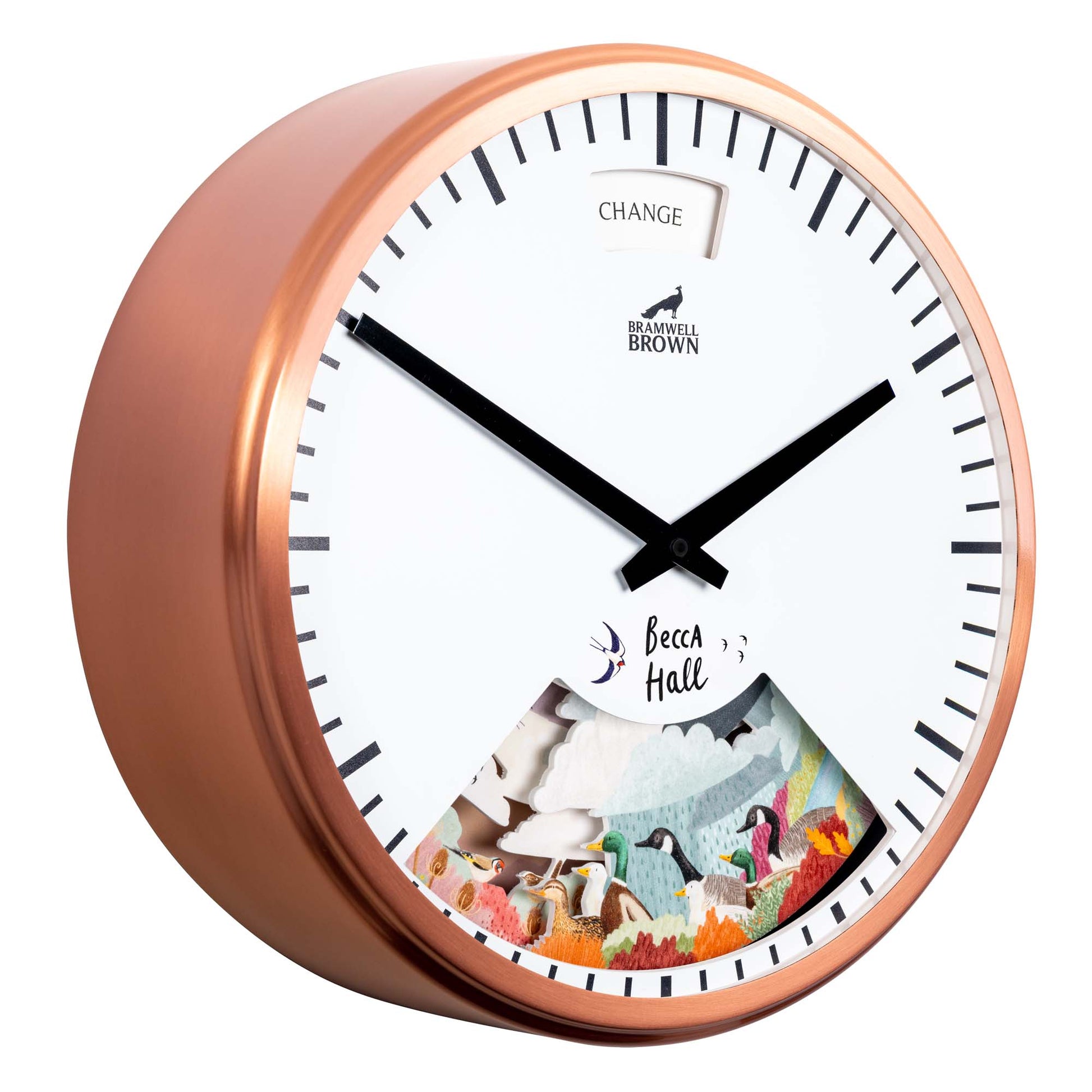 A copper-framed wall clock with black hands and a white face. The lower part features colorful illustrations of birds and nature, and a label reading Becca Hall. The top has a CHANGE sign near 12 oclock.