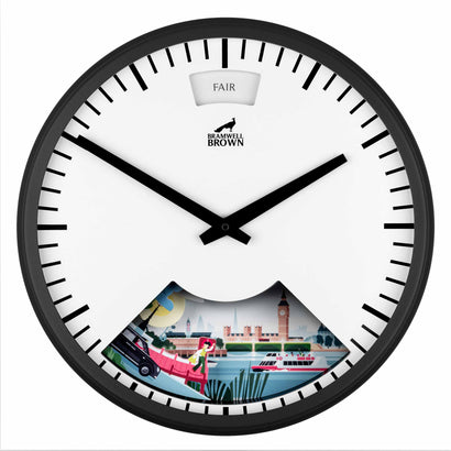 The London Weather Clock - Southbank Edition is a round Japanese art wall clock with black hands, a "FAIR" weather indicator at the top, and a colorful scene of Big Ben, boats, and people at the bottom.