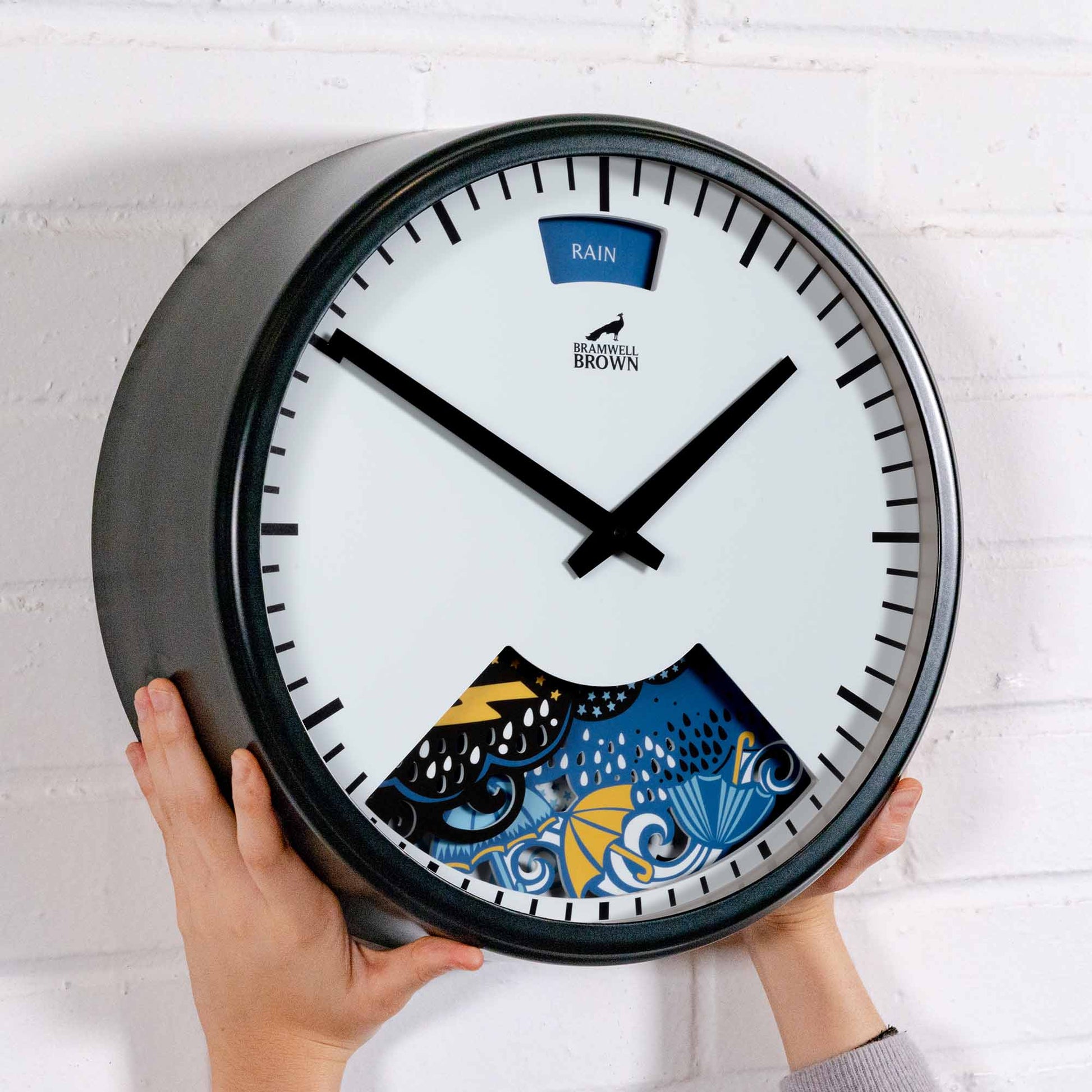 Papercut Clouds Weather Clock by Emily Hogarth - Bramwell Brown Art Clocks