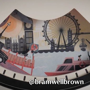 Illustration featuring London landmarks like Big Ben, the London Eye, and the Eiffel Tower, with a boat on the river and a person in a lifebuoy. @bramwellbrown is written at the bottom.