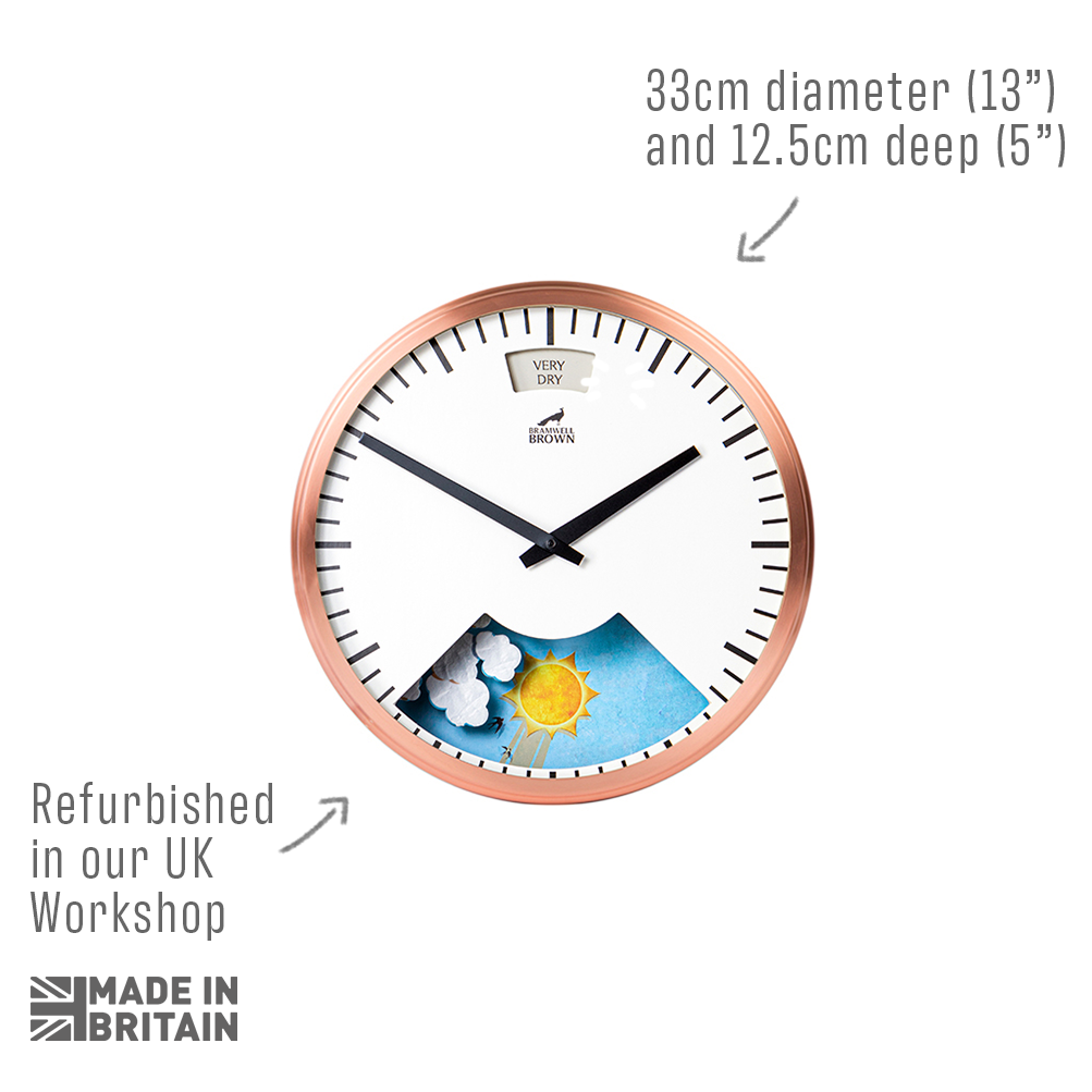 A round wall clock with a copper-colored frame, weather-themed illustration on the lower half, and black hands. Text notes its size—33cm diameter and 12.5cm deep—and that it’s refurbished in a UK workshop. Made in Britain logo.