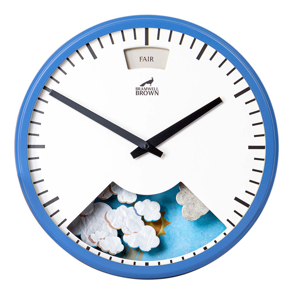 A wall clock with a blue frame, black hands, and a white face. There is a weather display showing clouds and sun at the bottom and the word FAIR in a small window at the top.