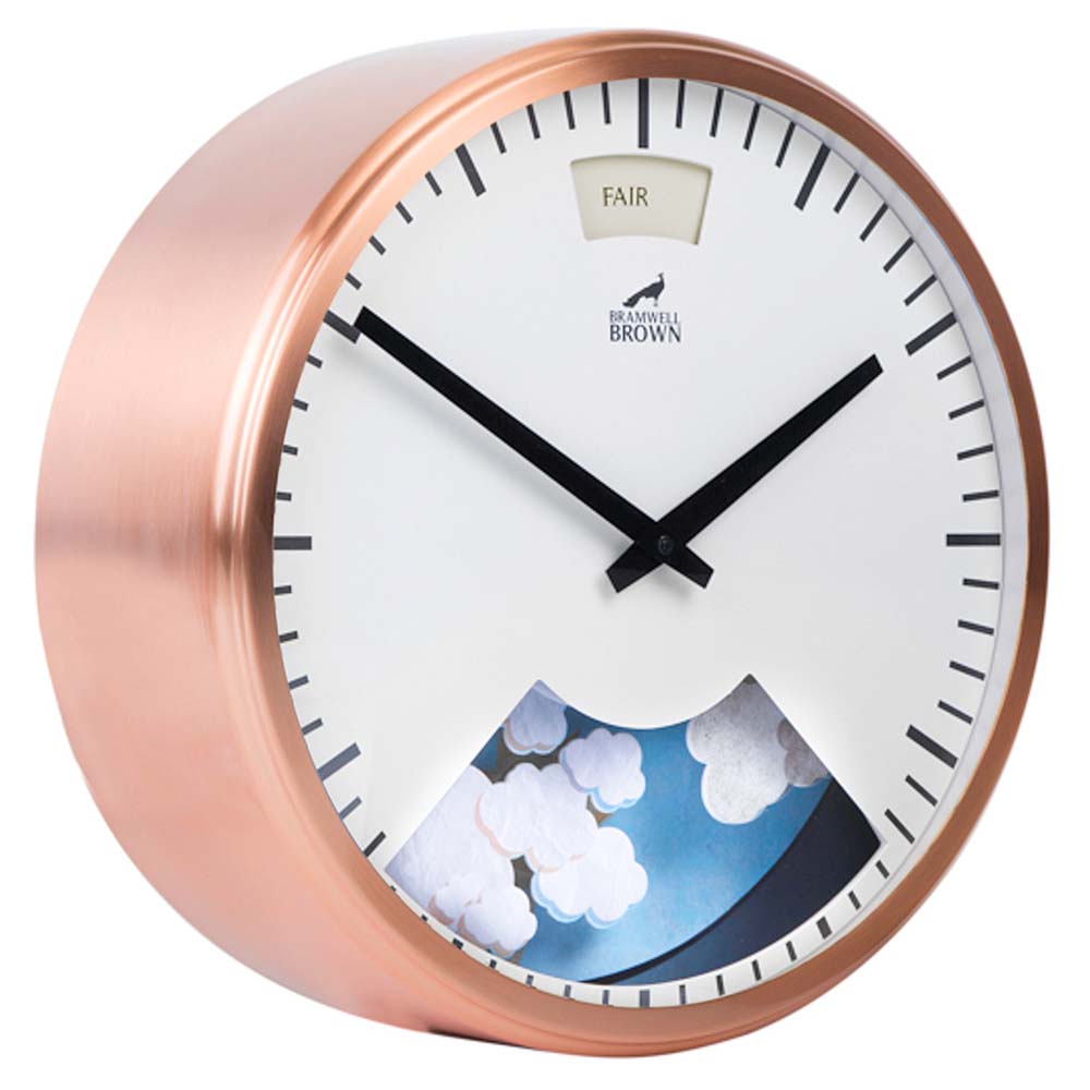 A round wall clock with a copper frame, black hands, and a white face. It features a cloud illustration at the bottom and a label reading FAIR at the top, indicating it tracks weather conditions.